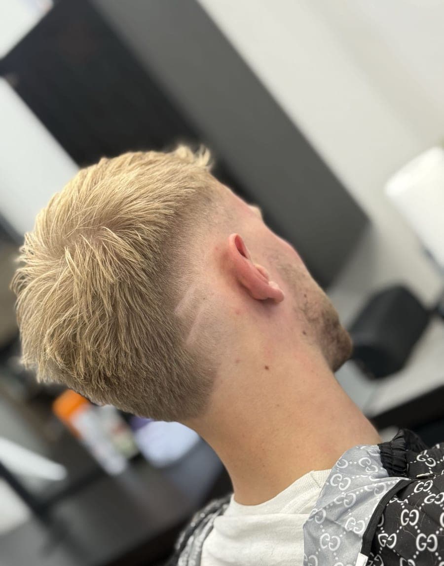Textured crop with skin fade haircut at Epic Barber, Woking