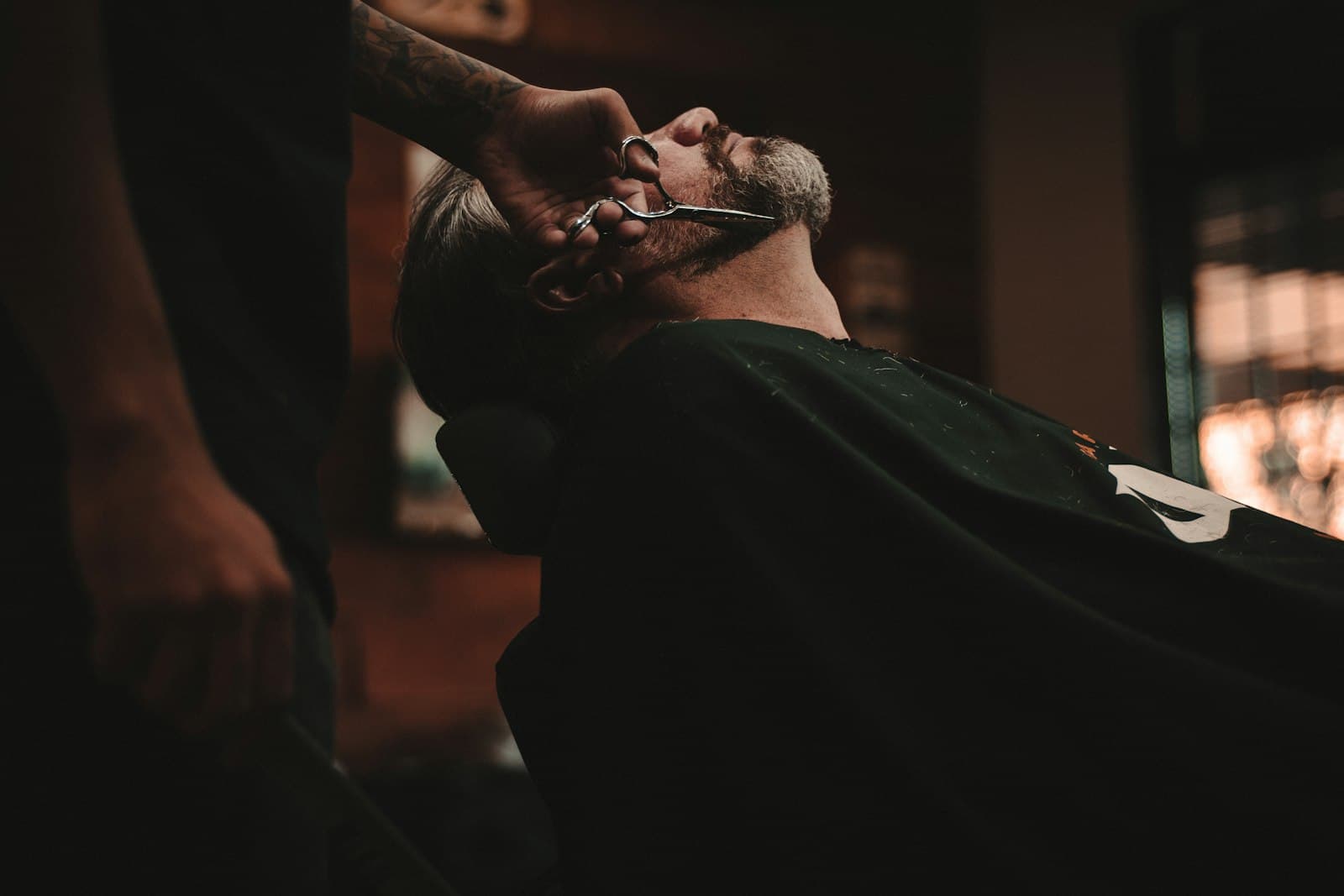 Master barber giving a precision cut at Epic Barber, Woking, Surrey